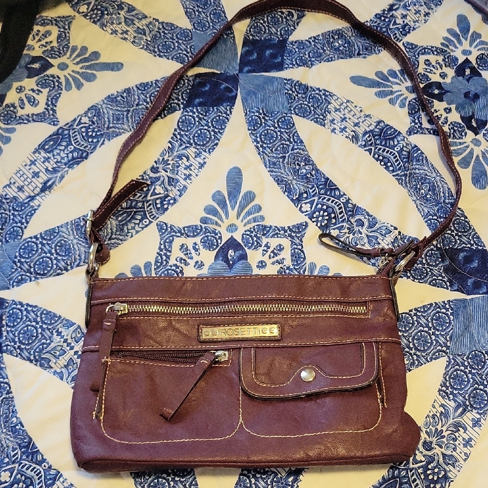 Rosetti Purple (Plum) Crossbody Bag with Polished Finish. No Call Outs. Nice!